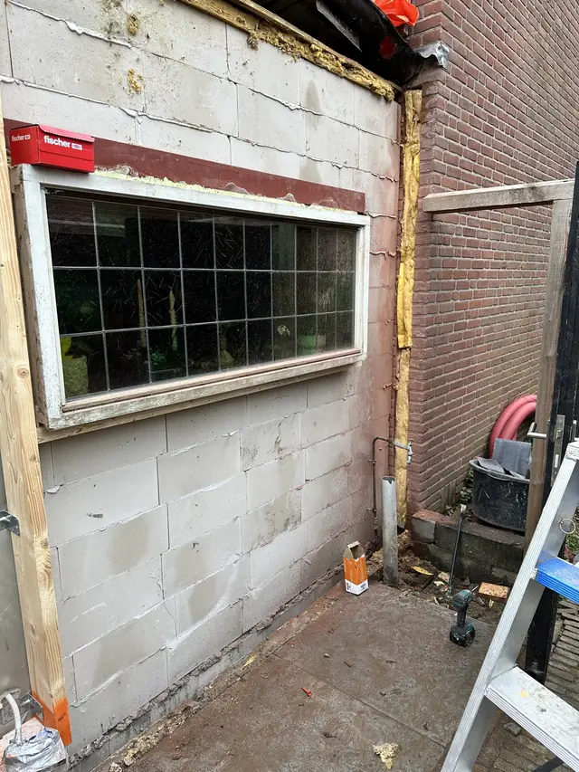Dakopbouw met houten gevelbekleding, foto 2 van 16