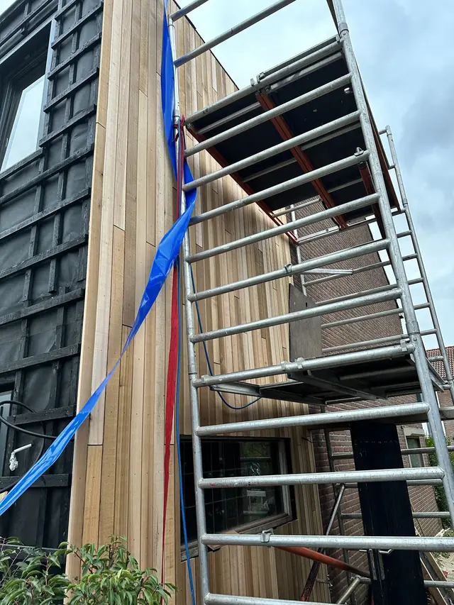 Dakopbouw met houten gevelbekleding, foto 5 van 16