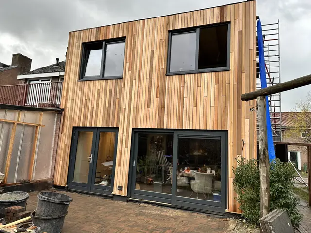 Dakopbouw met houten gevelbekleding, foto 6 van 16