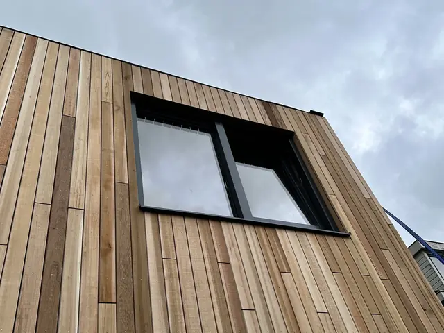 Dakopbouw met houten gevelbekleding, foto 9 van 16