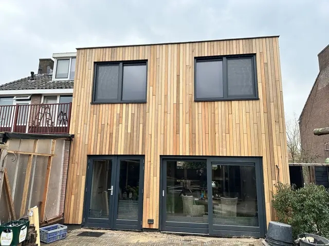 Dakopbouw met houten gevelbekleding, foto 15 van 16