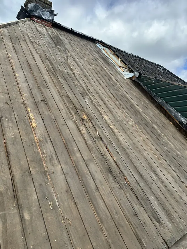 Dak vernieuwd met nieuwe pannen en dakraam, foto 3 van 27