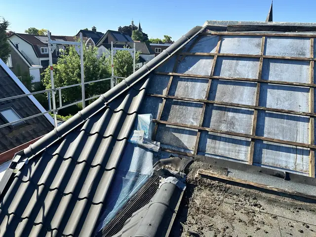 Dak vernieuwd met nieuwe pannen en dakraam, foto 5 van 27