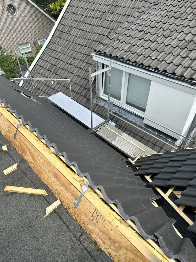 Dak vernieuwd met nieuwe pannen en dakraam, foto 11 van 27