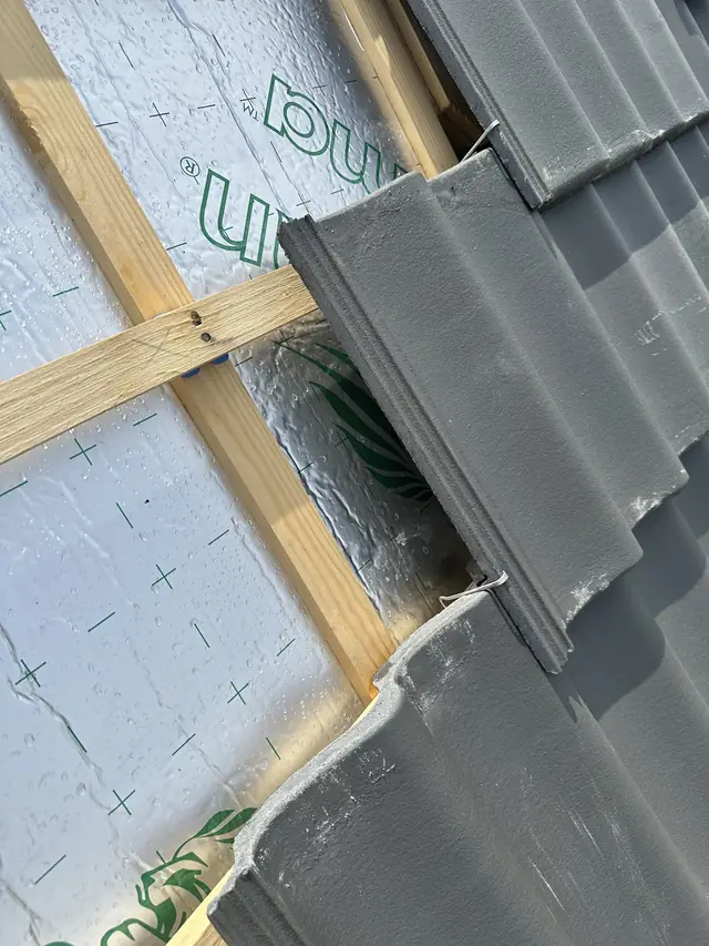 Dak vernieuwd met nieuwe pannen en dakraam, foto 12 van 27