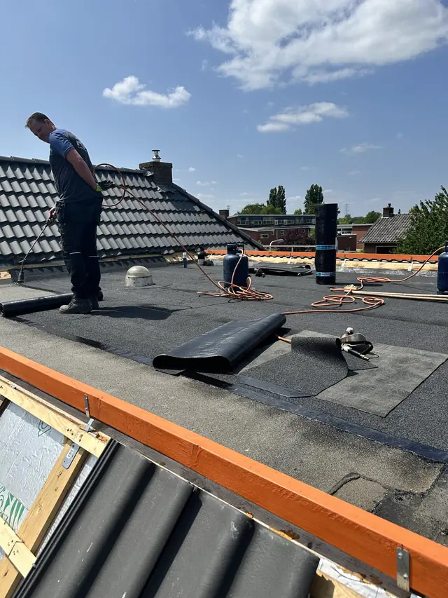 Dak vernieuwd met nieuwe pannen en dakraam, foto 15 van 27
