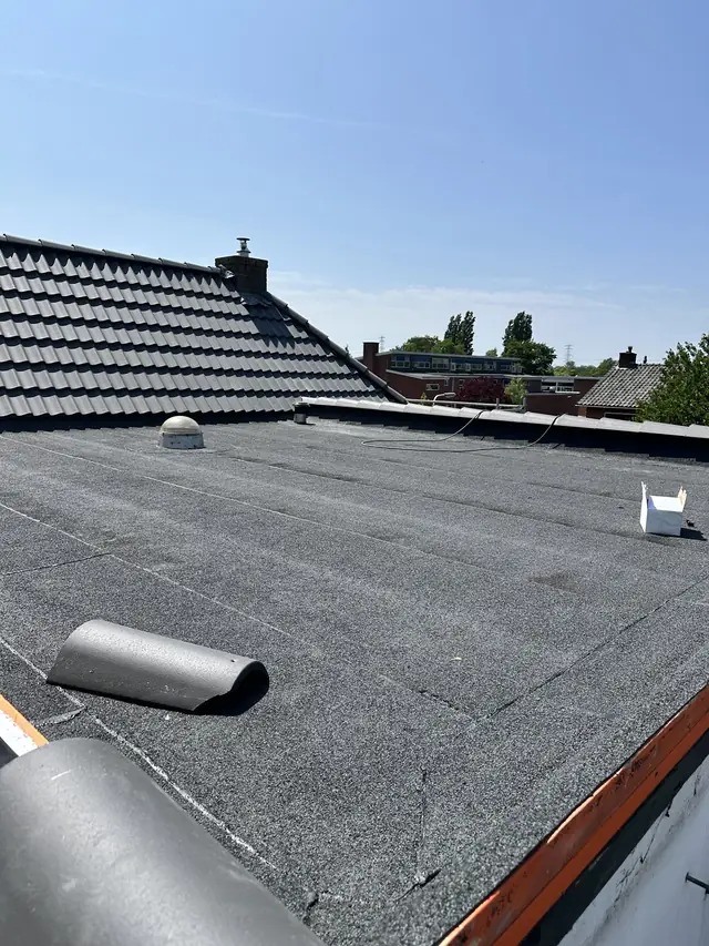 Dak vernieuwd met nieuwe pannen en dakraam, foto 17 van 27