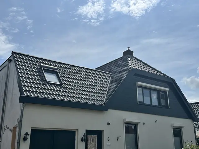 Dak vernieuwd met nieuwe pannen en dakraam, foto 1 van 27